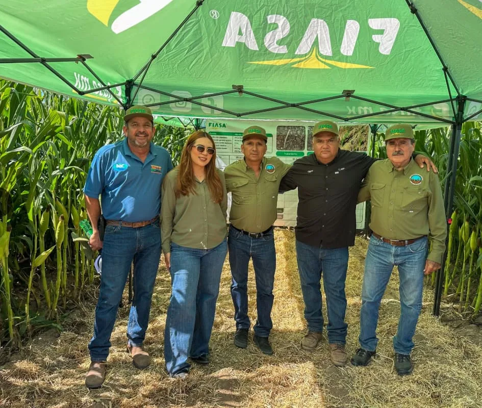 FIASA team presenting a demonstration plot in a corn field